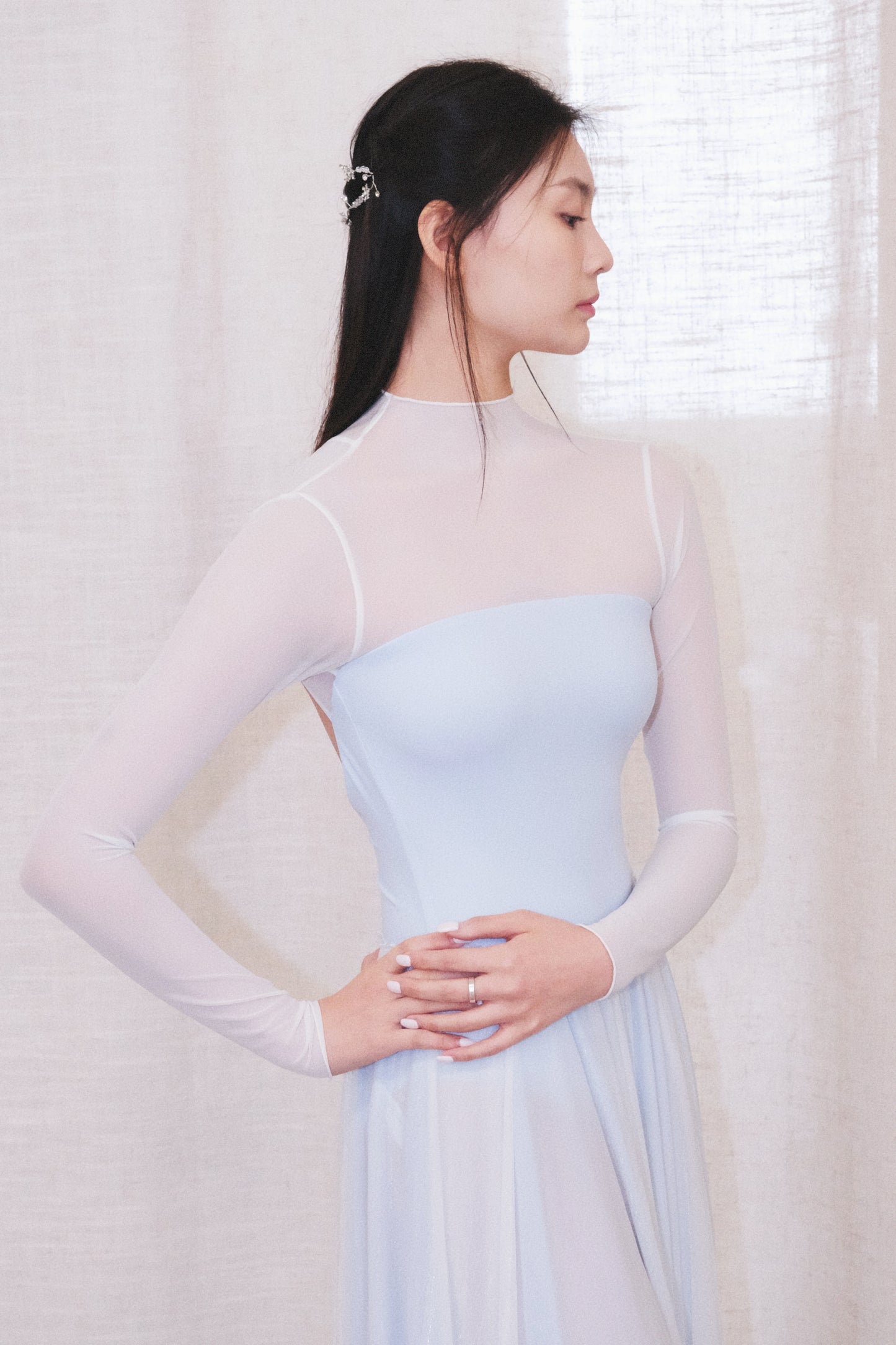 「No.9」Mock Neck Mesh Long Sleeve Leotard is in a beautiful glacier blue and soft breeze color.