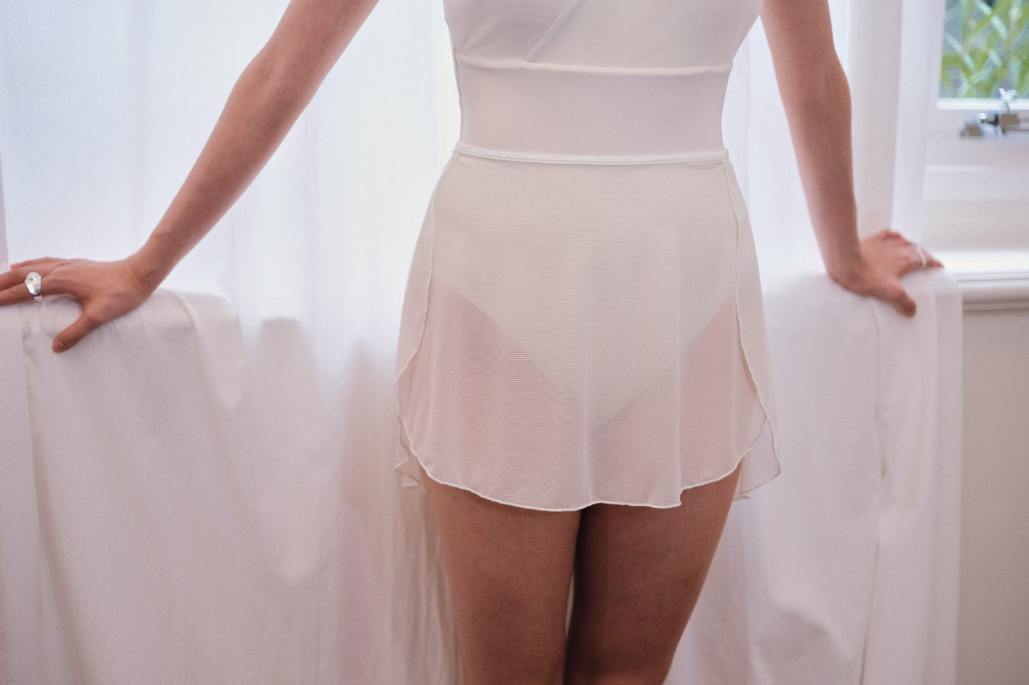 Dawn White Melt Mesh Ballet Skirt features side openings which allow for airflow and unrestricted movement for maximum comfort.
