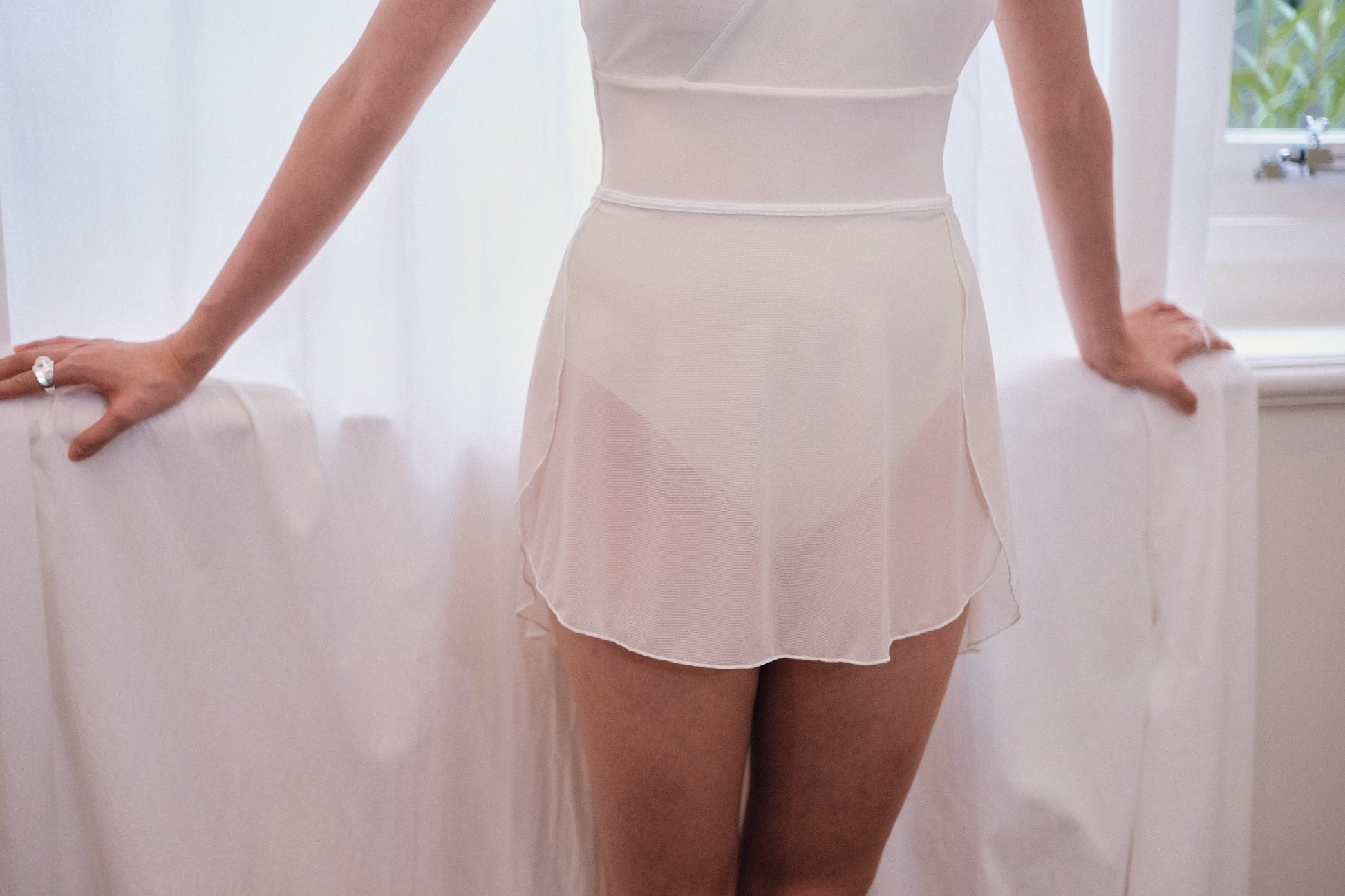 Dawn White Melt Mesh Ballet Skirt features side openings which allow for airflow and unrestricted movement for maximum comfort.
