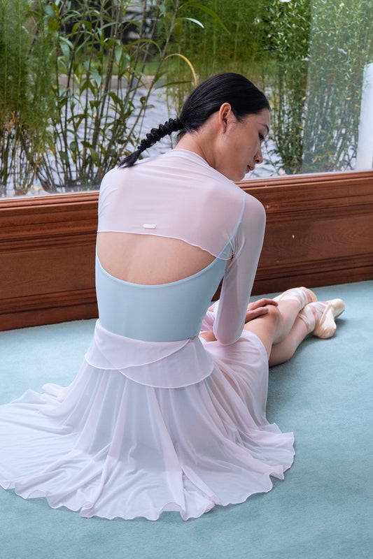 Dewy Pink Ultra-Stretch Ballet Mesh Shrug features natural white mother-of-pearl logo plate to add an extra touch of sophistication