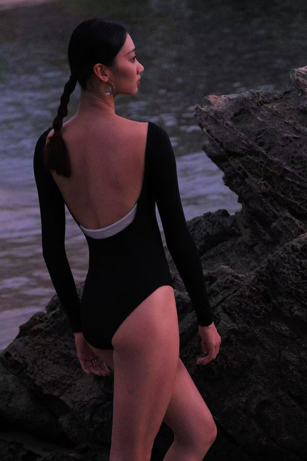 The New Moon Wide Boatneck Long Sleeve Leotard features a open back which creates a clean, timeless silhouette that evokes the quiet elegance of the night sky