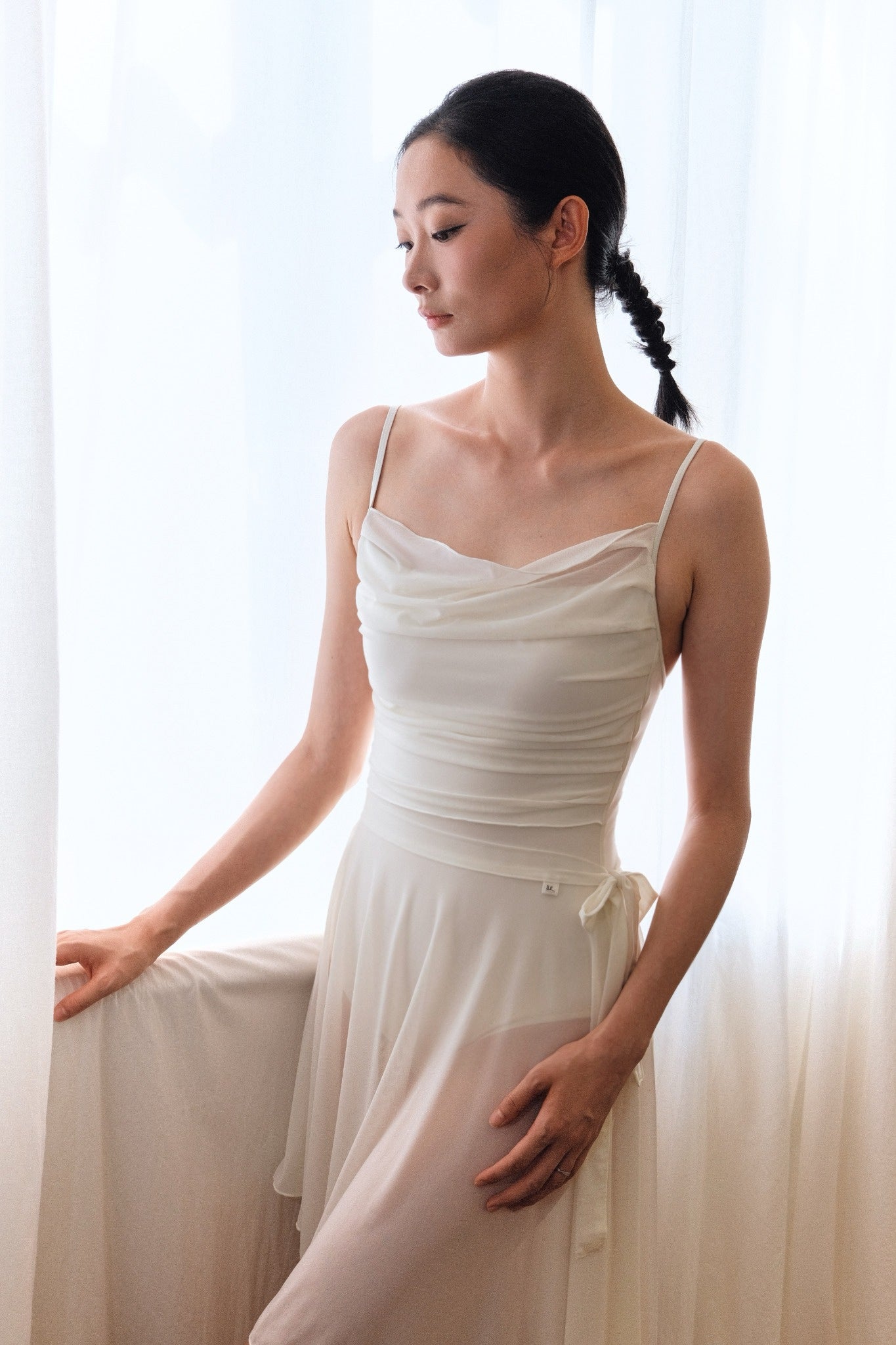 「No.6」Mesh Draped Camisole Leotard - Cloud Dancer is paired with our dawn white autumn haze skirt for an ultimate graceful look