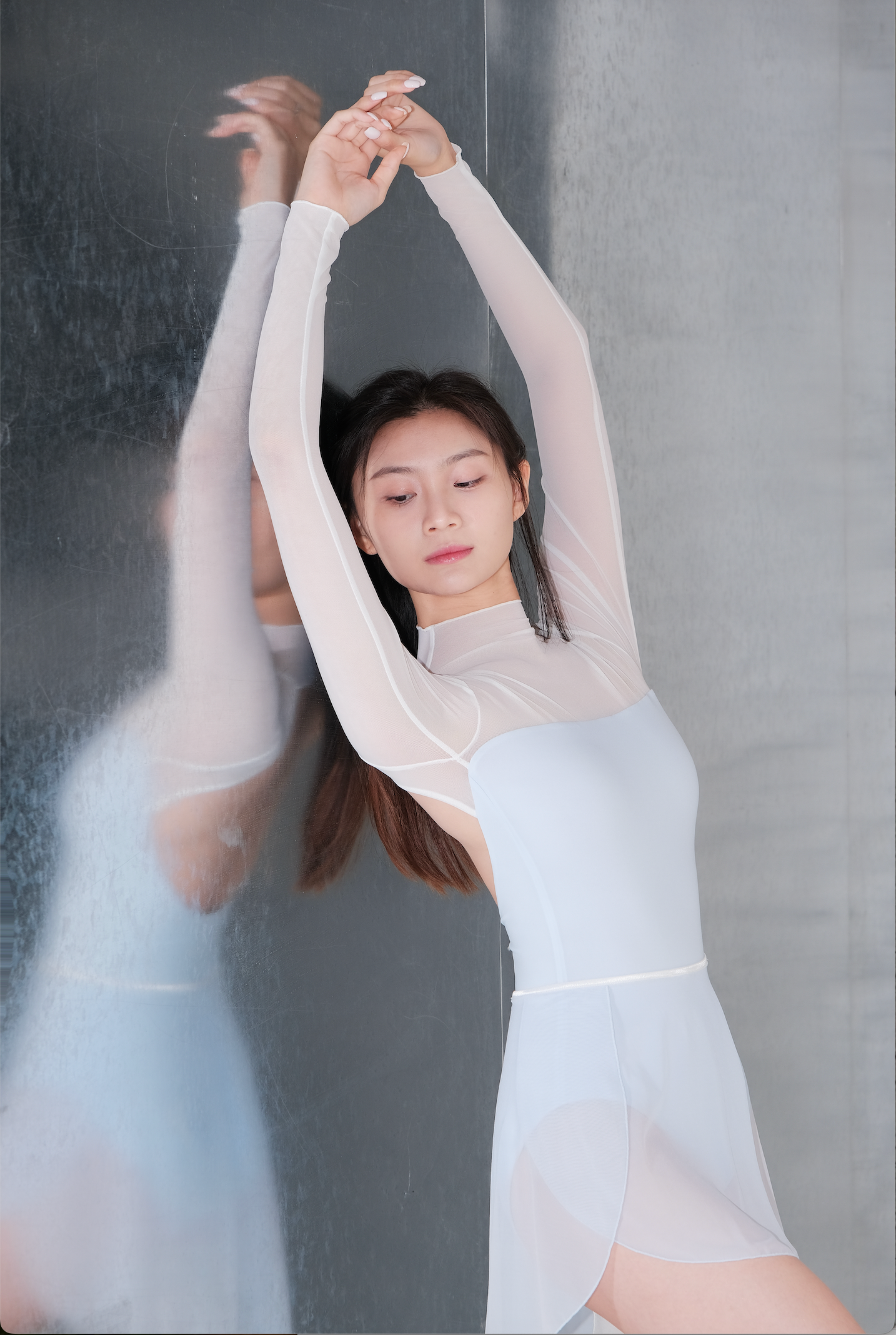 「No.9」Mock Neck Mesh Long Sleeve Leotard features a delicate sheer mesh panel creates a refined, structured look
