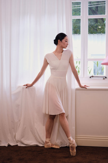 Dancer in dawn white Pull-On Full-Circle Ballet Rehearsal Skirt, made with eco-friendly fabrics that is ultra-soft