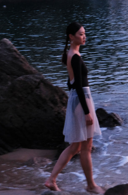 The New Moon Wide Boatneck Long Sleeve Leotard is a piece that celebrates growth, resilience, and the radiant light within every movement.